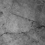 Dalle affaissée sur béton ancien